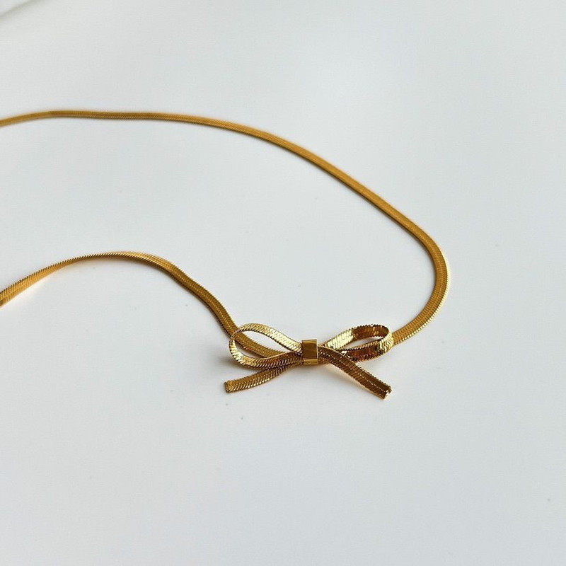 18K Gold Plated Bow-Tie Snake Chain Necklace - Image 4